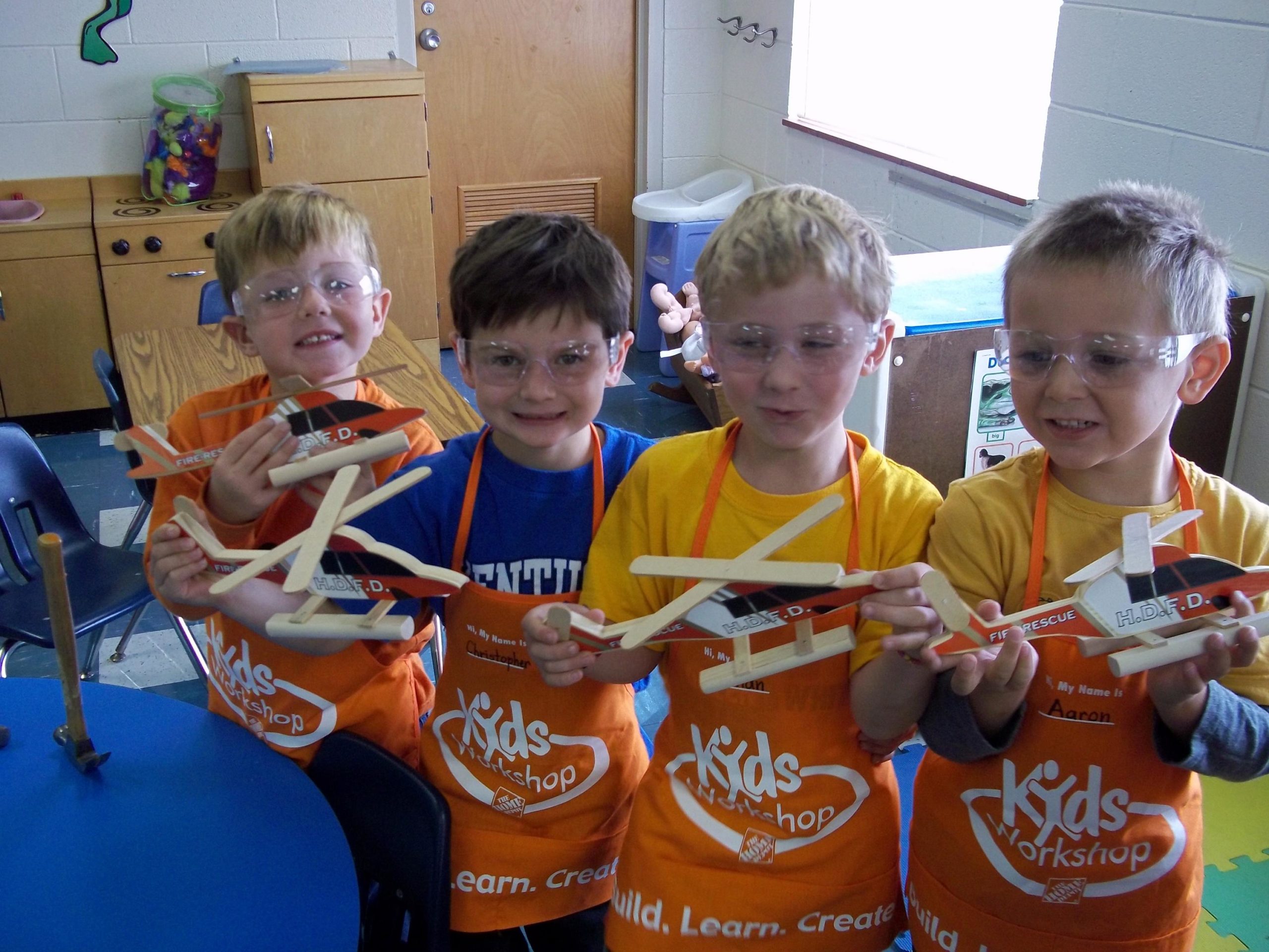 Jack, Christopher, Ethan, and Aaron Show off their helicopters.